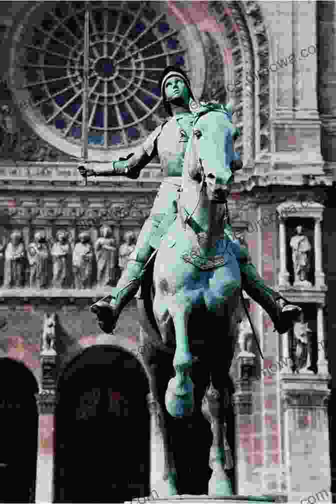 A Statue Of Joan Of Arc, Depicting Her As A Young Woman Wearing Armor And Holding A Sword. Sparrow: The Story Of Joan Of Arc