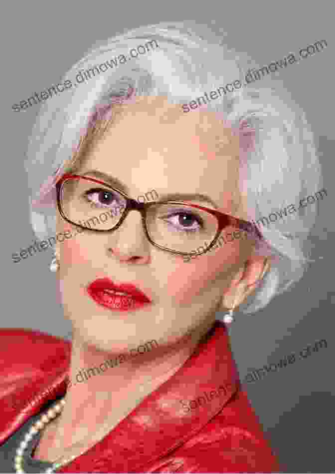 Alyce Mahon, A Smiling Woman With Short Gray Hair Wearing A Red Blazer Female Force: Dolly Parton Alyce Mahon